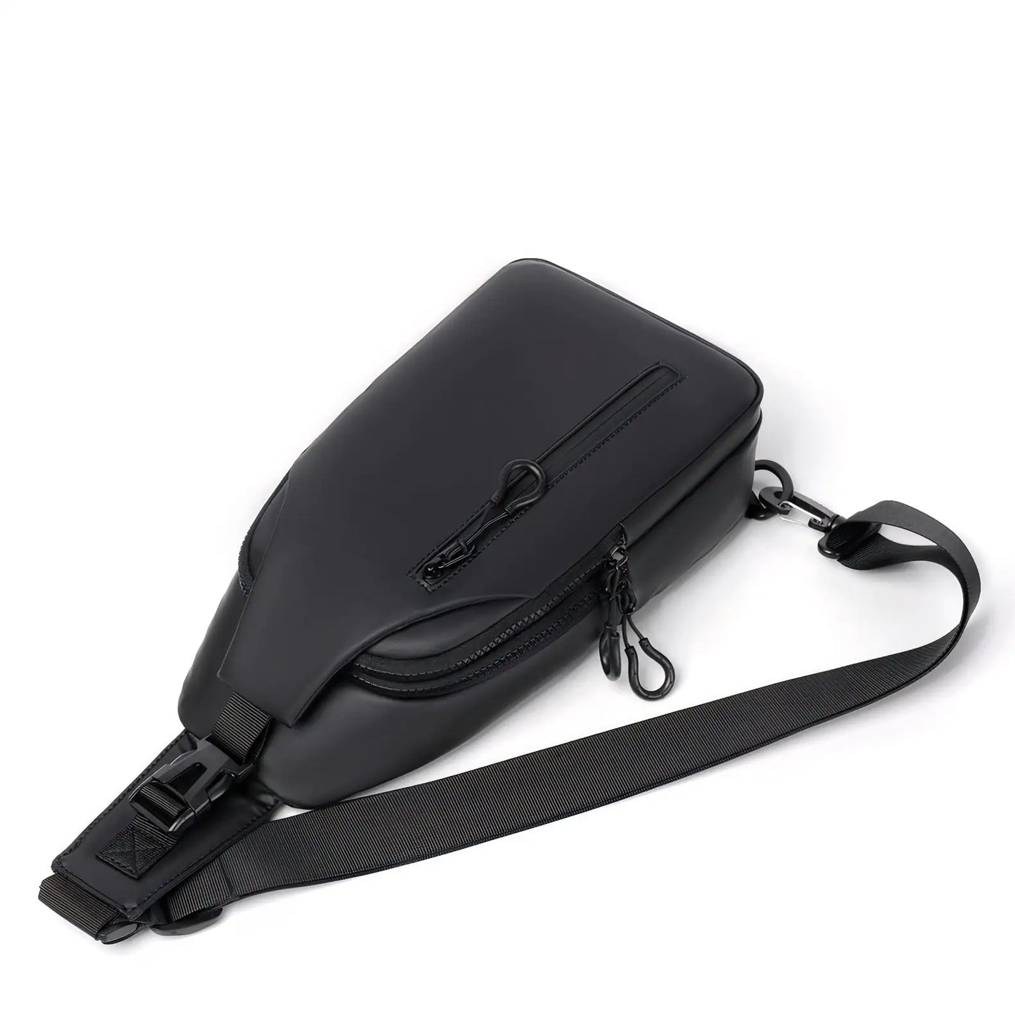 Sleek crossbody sling bag with hidden zippers, USB charging port, and adjustable strap.
