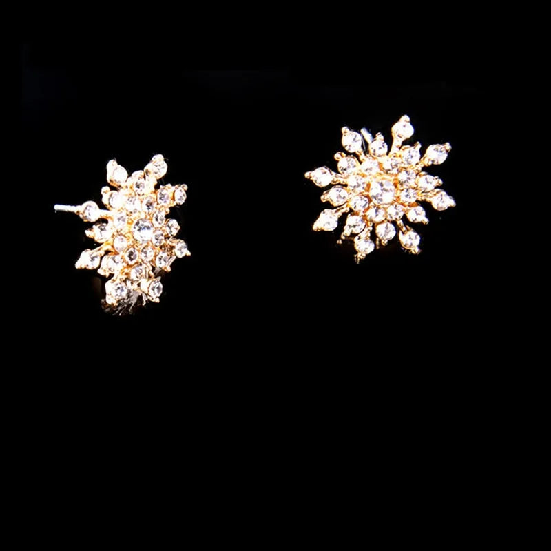 Crystal Snowflake Stud Earrings with intricate designs and dazzling crystals