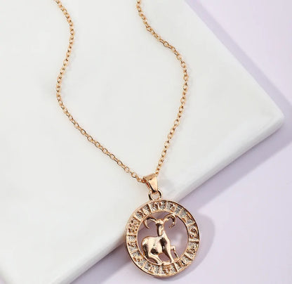 Fortune Zodiac Necklace with a bold copper pendant and link chain