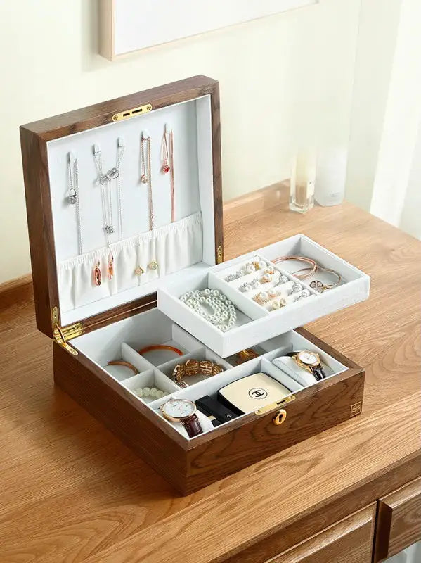 Wooden jewelry box by Krystina Trendify with multiple compartments and a sophisticated design, perfect for organizing and decorating any room.