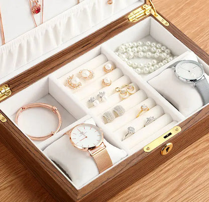 Wooden jewelry box by Krystina Trendify with multiple compartments and a sophisticated design, perfect for organizing and decorating any room.