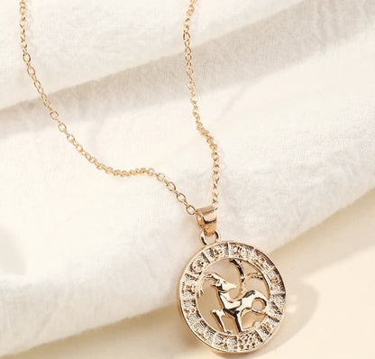 Fortune Zodiac Necklace with a bold copper pendant and link chain