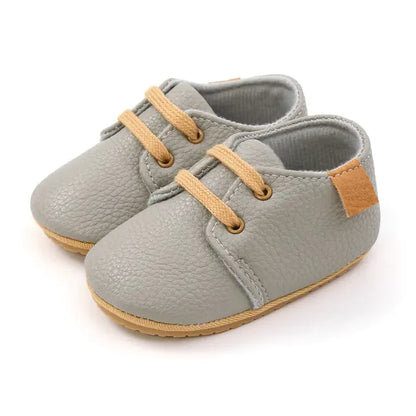 Colorful retro baby leather shoes with non-slip soles by Krystina Trendify.