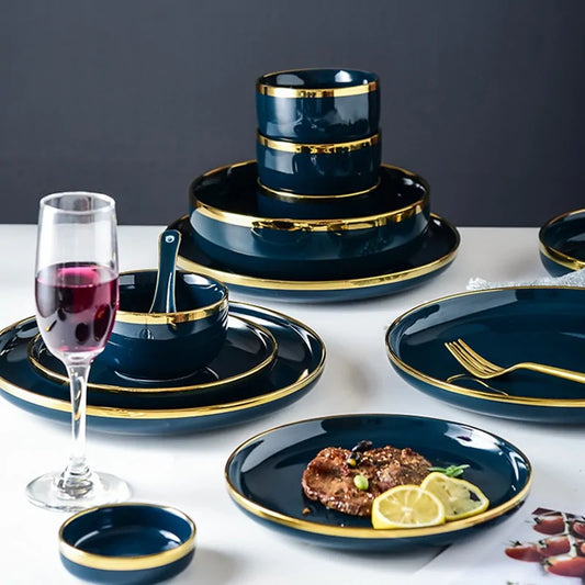 Blue porcelain dinner plates with golden rim for elegant dining