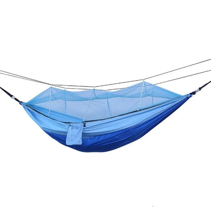 Portable hammock with built-in mosquito net by Krystina Trendify for camping and relaxation