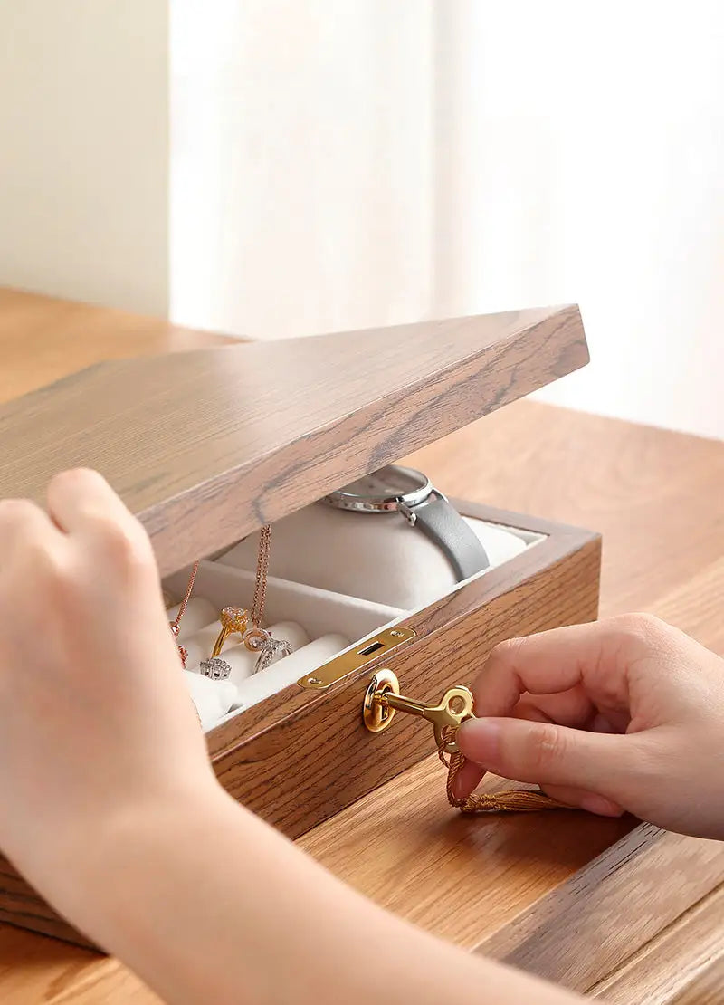 Wooden jewelry box by Krystina Trendify with multiple compartments and a sophisticated design, perfect for organizing and decorating any room.