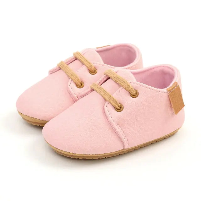 Colorful retro baby leather shoes with non-slip soles by Krystina Trendify.