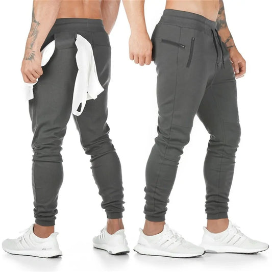 Men's sweatpants by Krystina Trendify, featuring an elastic waist, pockets, and a flexible fit for comfort and durability. Perfect for workouts and lounging.