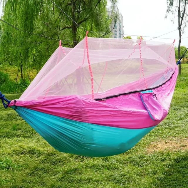 Portable hammock with built-in mosquito net by Krystina Trendify for camping and relaxation