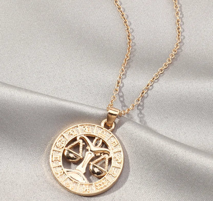 Fortune Zodiac Necklace with a bold copper pendant and link chain