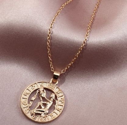 Fortune Zodiac Necklace with a bold copper pendant and link chain