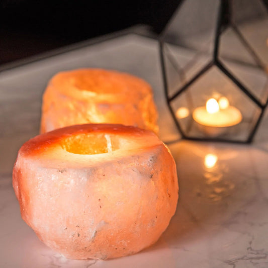 Himalayan salt candle holder handcrafted from natural rock salt for air purification and stress relief.