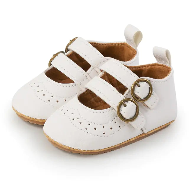 Colorful retro baby leather shoes with non-slip soles by Krystina Trendify.