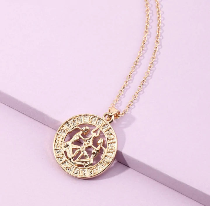 Fortune Zodiac Necklace with a bold copper pendant and link chain