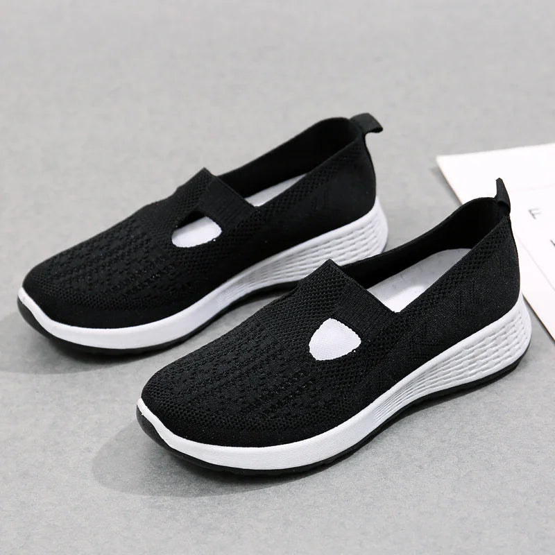 Breathable slip-on shoes with mesh upper and non-slip sole by Krystina Trendify for everyday wear and outdoor adventures.