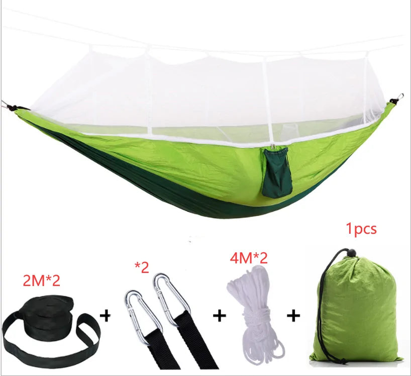 Portable hammock with built-in mosquito net by Krystina Trendify for camping and relaxation