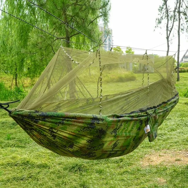 Portable hammock with built-in mosquito net by Krystina Trendify for camping and relaxation