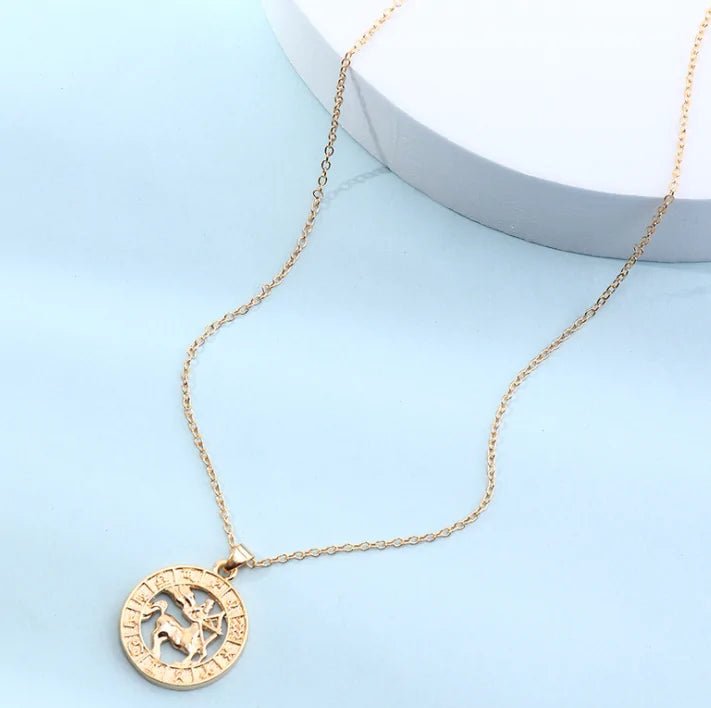 Fortune Zodiac Necklace with a bold copper pendant and link chain