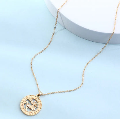 Fortune Zodiac Necklace with a bold copper pendant and link chain