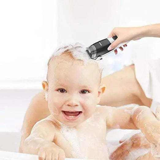 Automatic Inhaling Hair Clipper for kids with precise cuts and mess-free cleanup using integrated vacuum.
