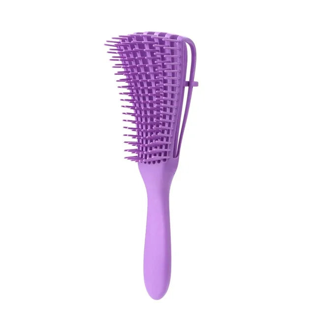 Curly hair detangling brush for reduced breakage and enhanced texture.