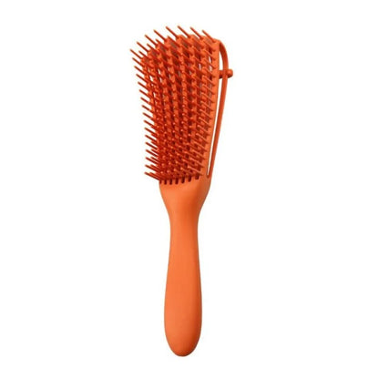 Curly hair detangling brush for reduced breakage and enhanced texture.