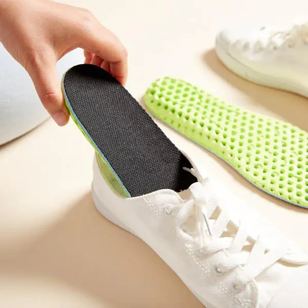 HeelBoosts running insoles by Krystina Trendify, designed to enhance stride, improve efficiency, and provide breathable comfort for any shoe.