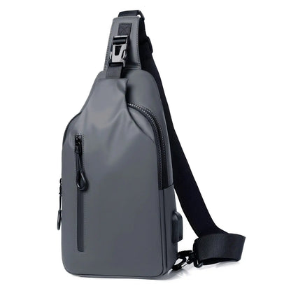 Sleek crossbody sling bag with hidden zippers, USB charging port, and adjustable strap.
