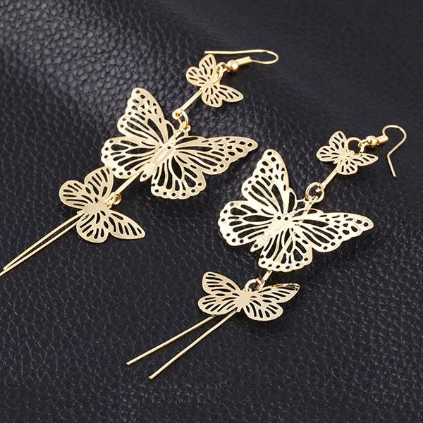 Rhinestone Butterfly Stud Earrings, crafted with shimmering rhinestones and stainless steel for a sparkling touch.