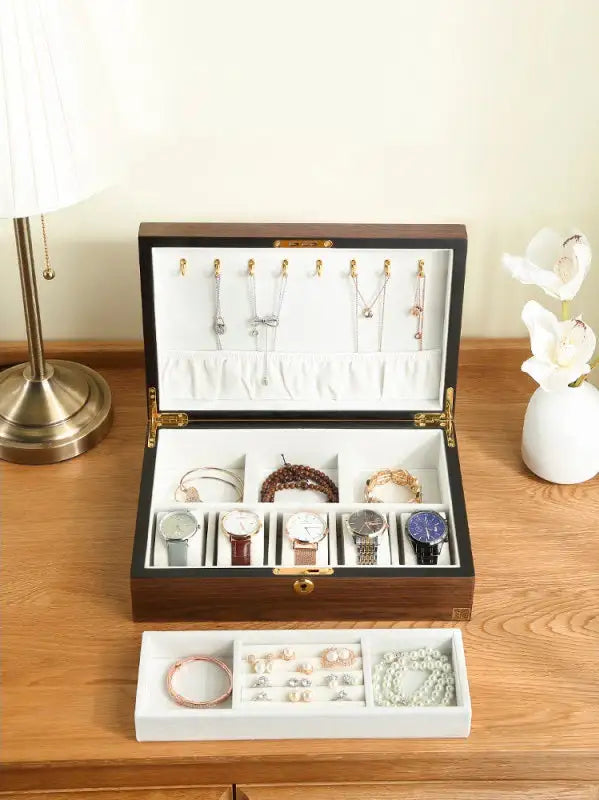 Wooden jewelry box by Krystina Trendify with multiple compartments and a sophisticated design, perfect for organizing and decorating any room.