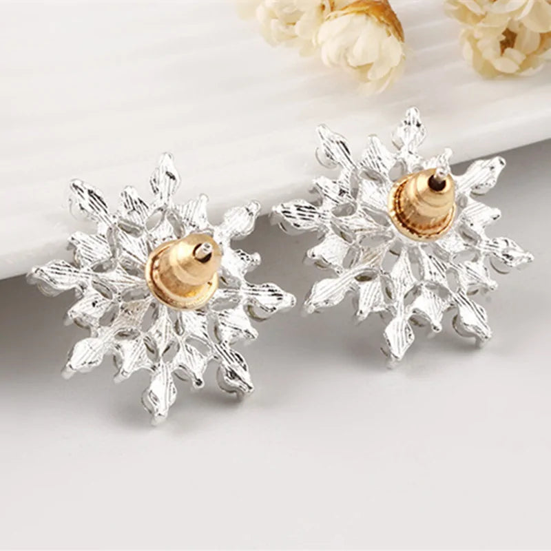 Crystal Snowflake Stud Earrings with intricate designs and dazzling crystals